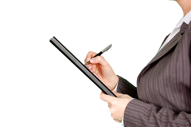 invited smart heating systems specialist working on thermostat control panel