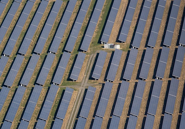 solar generator integration specialist inspecting solar panel array on canadian rooftop